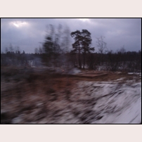 468 Lopas den 4 november 2009, dagen efter den förödande branden. Bilden är tagen från ett förbipasserande tåg och i dåligt fotoljus. Foto: Martin Långström. 