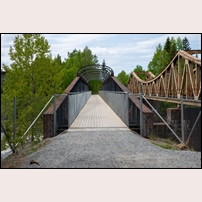 Edänge 2023, den äldsta bron över Ljusnan vid Edänge har försetts med brobana av plank och upplåtits för cykel- och gångtrafik.  Foto: Morgan Börjesson Rehn. 